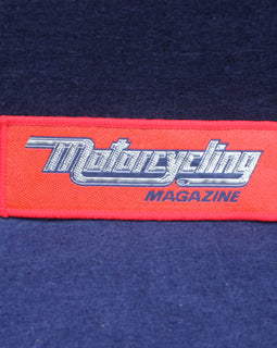 Red patch with 'Motorcycling Magazine' text on a dark red background
