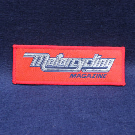 Red patch with 'Motorcycling Magazine' text on a dark red background