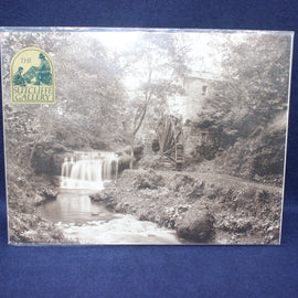 Black and white image of a waterfall and mill with 'Sutcliffe Gallery' logo.