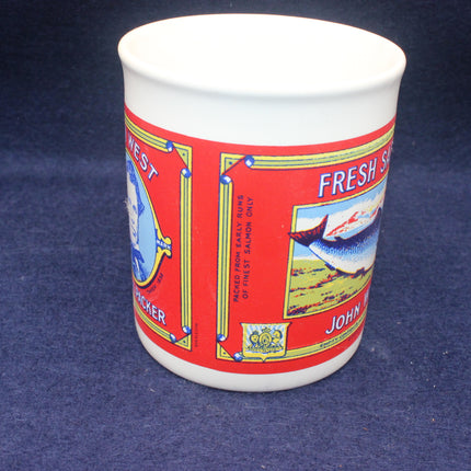 Mug with a colorful label featuring text and graphics on a blue background