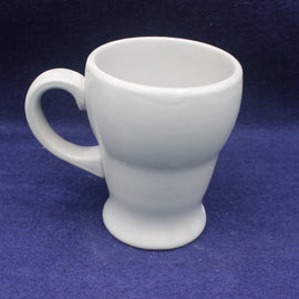Green Dudson 1960 ceramic mug on a blue background