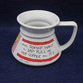 White mug with colorful design and text on a dark blue background