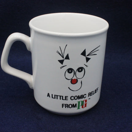 White mug with a cartoon face and text on a dark background