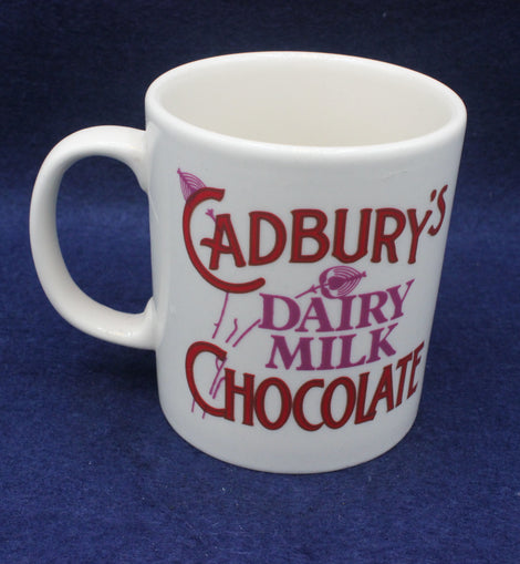 White mug with Cadbury's Dairy Milk Chocolate text on a blue background