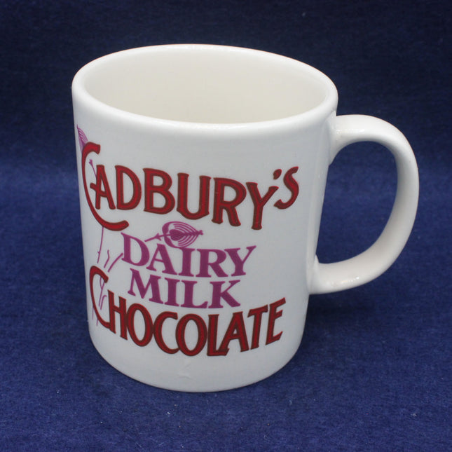 White mug with Cadbury's Dairy Milk Chocolate text on a blue background