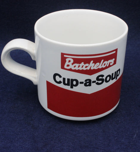 White mug with Batchelors Cup-a-Soup logo on a dark blue background
