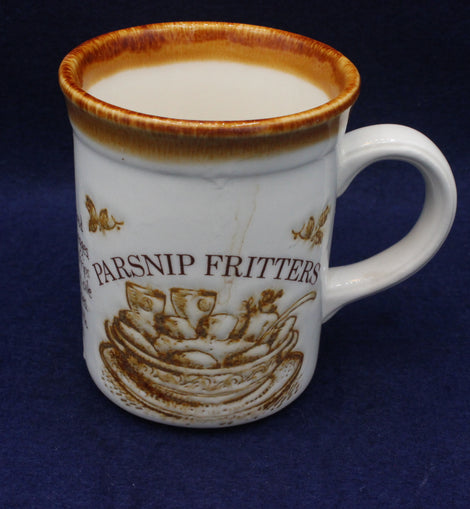 White mug with brown parsnip fritters text and graphics on a blue background