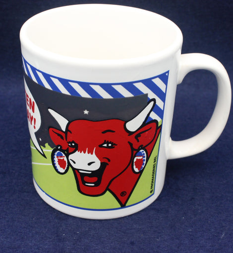 Mug with a bull graphic and text on a blue background