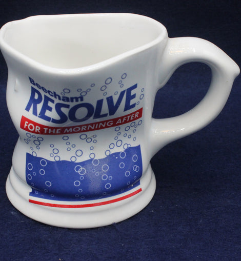 White ceramic mug with 'Resolve' branding on a dark blue background