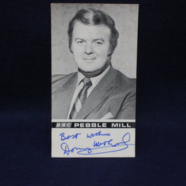 Vintage card with a black and white photo of a man in a suit and tie, signed 'Best wishes' by 'Donny Macleod', on a dark background.