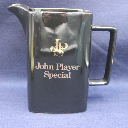 Black pitcher with 'John Player Special' branding on a blue background
