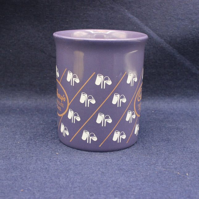 Glasses of milk on purple mug