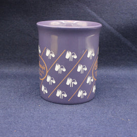 Glasses of milk on purple mug