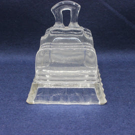 Clear glass toast rack on a blue background