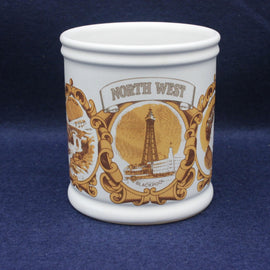 White mug with gold and brown design featuring Blackpool Tower on a blue background