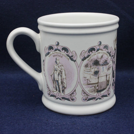 White mug with purple and black decorative design on a blue background