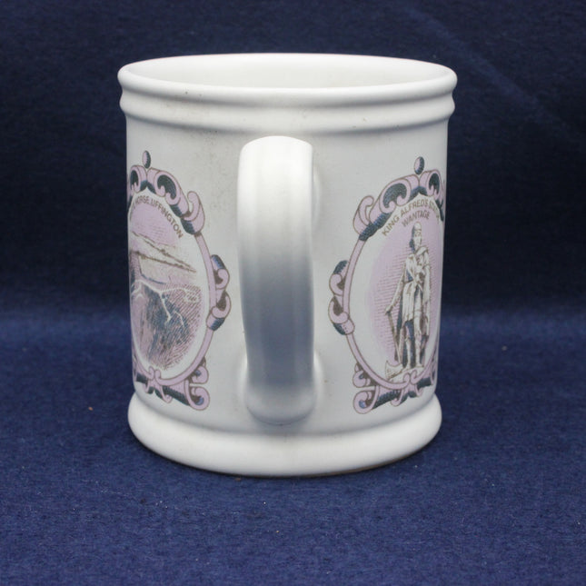 White mug with purple decorative elements on a blue background