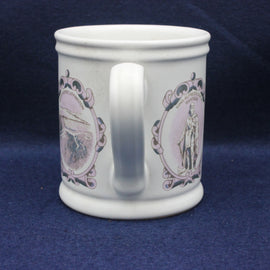 White mug with purple decorative elements on a blue background