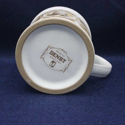 Denby England mug on a blue background
