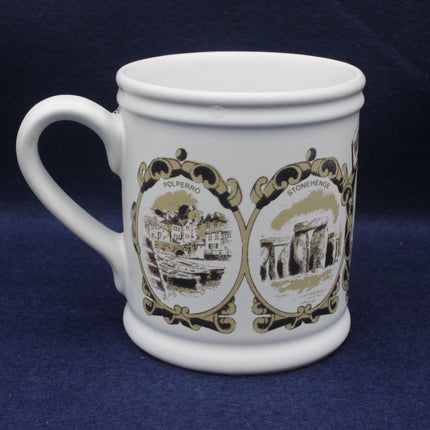White mug with decorative designs on a blue background