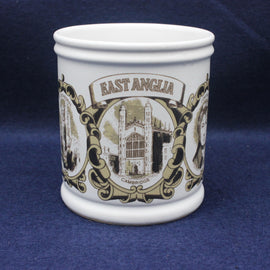 White mug with 'East Anglia' and architectural design on a blue background