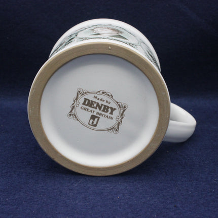 Denby mug with a visible brand logo on a dark blue background