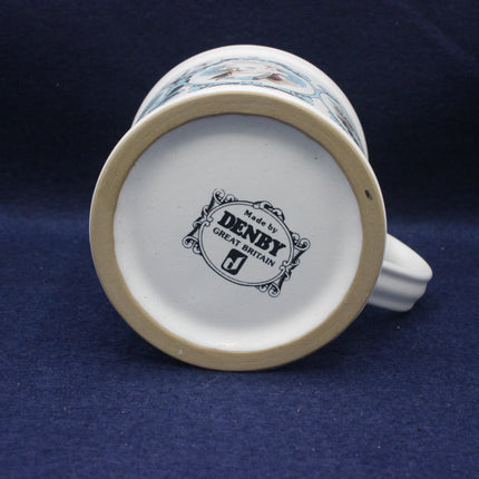 Ceramic mug with 'Denby' branding on a blue background