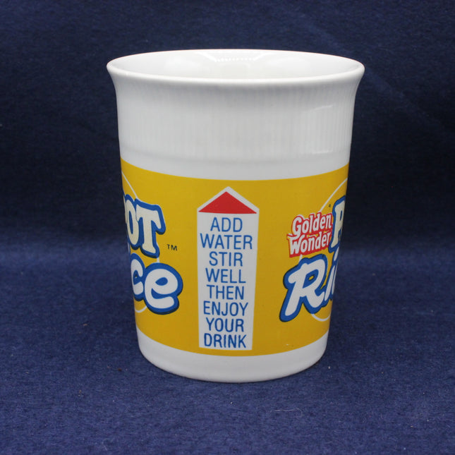 White cup with yellow label featuring Golden Wonder Rice on a blue background