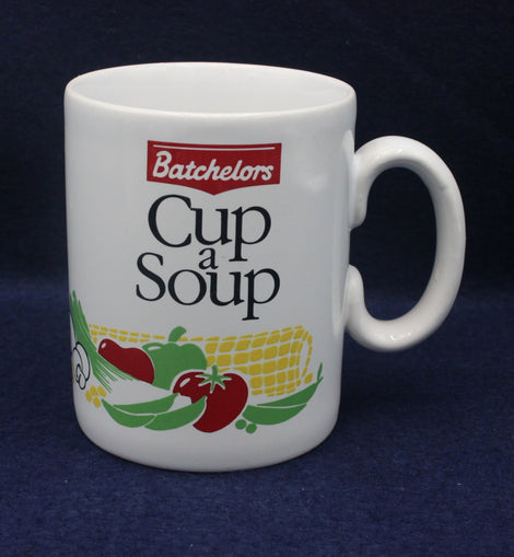 White mug with Batchelors Cup a Soup branding on a dark blue background