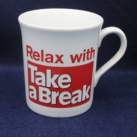 White mug with red Take a Break text on a blue background
