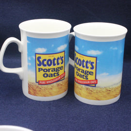 Two mugs with Scott's Porage Oats branding on a blue background