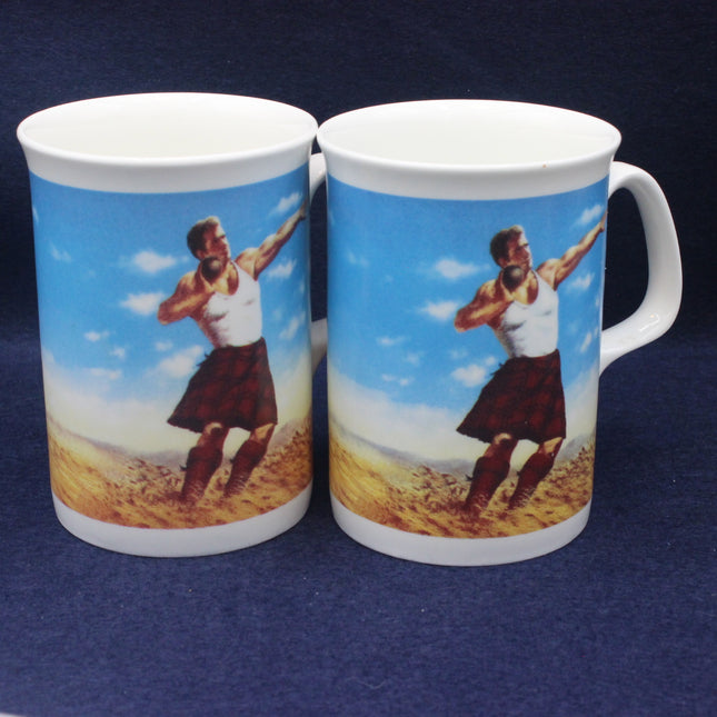 Two mugs with a printed design of a man in a kilt stone putting on a blue background