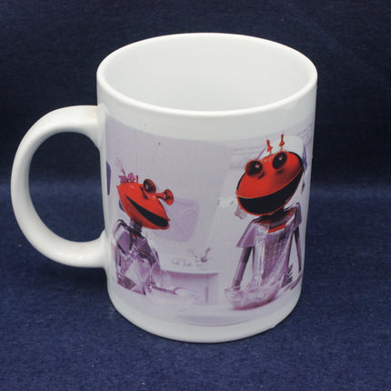 White mug with a graphic design of two red and black robots on a purple background