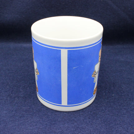 Mug with blue label and white lid on a dark blue background