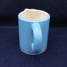 You only get a hug from a Batchelors mug text on blue mug