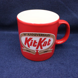KitKat 50th anniversary mug on a dark blue background