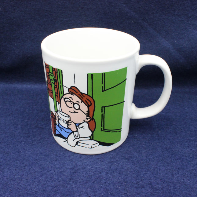 White mug with Tetley Tea Folk cartoon character design on a blue background