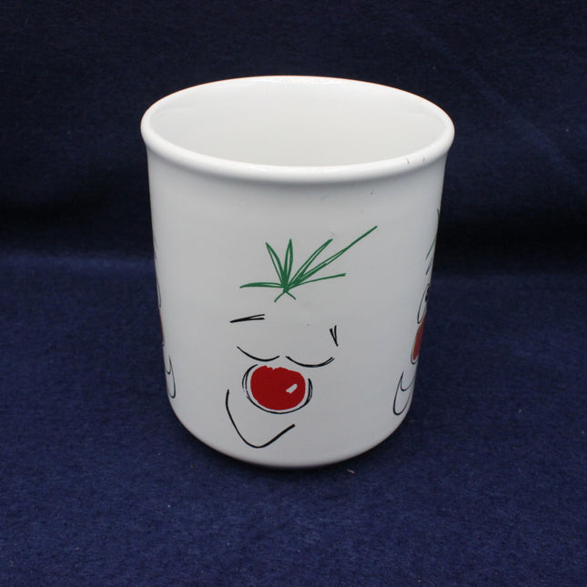 White ceramic cup with a face design on a dark blue background