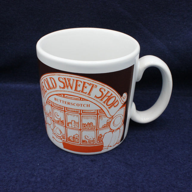 Mug with 'Old Sweet Shop' design on a dark blue background