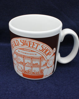 Mug with 'Old Sweet Shop' design on a dark blue background