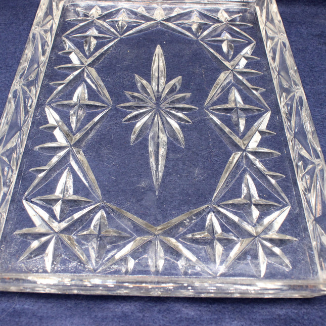 Decorative crystal box with star patterns on a blue background