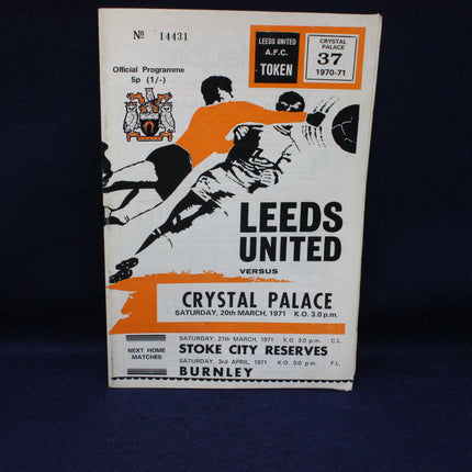 Vintage football match programme for Leeds United vs Crystal Palace on a dark background