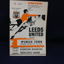 Vintage football match programme for Leeds United vs Ipswich Town, featuring black and white illustrations on a dark background.