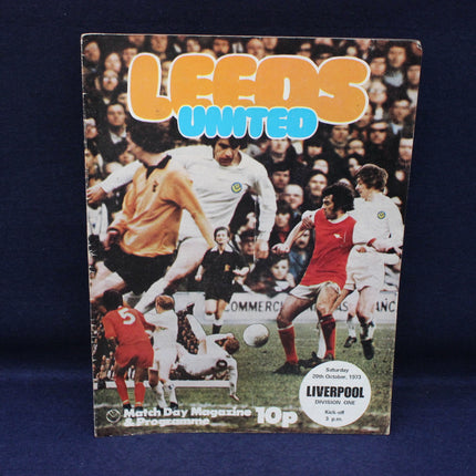 Vintage Leeds United match day magazine cover with soccer players on a blue background