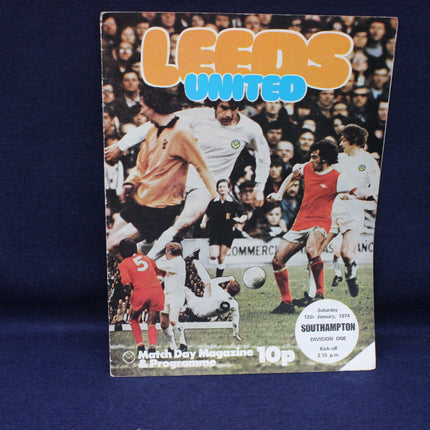 Vintage Leeds United football match day magazine cover with players on a blue background