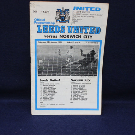 Vintage football match programme between Leeds United and Norwich City on a dark background