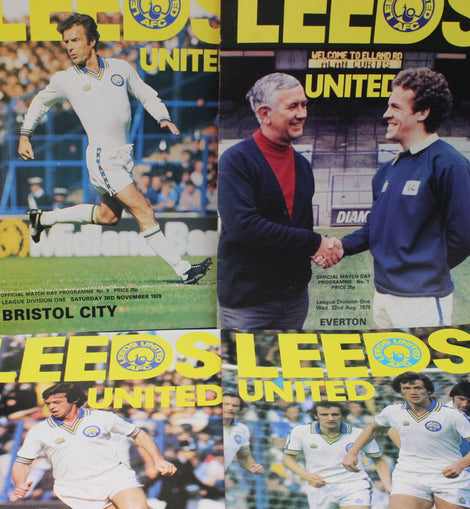 Collage of Leeds United football program covers from different matches.