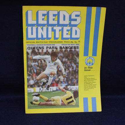 Leeds United football match programme cover with player action illustration on a yellow background