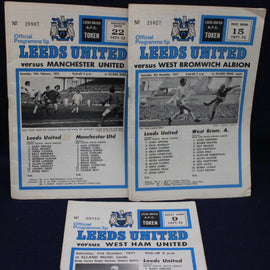 Three Leeds United football match programmes from 1971 against Manchester United, West Bromwich Albion, and West Ham United.