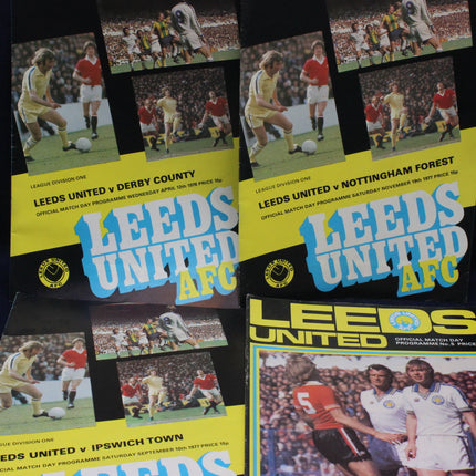 Collection of Leeds United AFC matchday programmes from various matches.